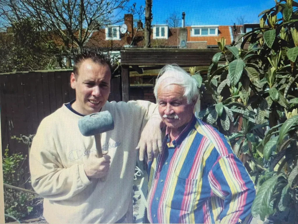 Dutch learning installation skills and craftsmanship while working with his father