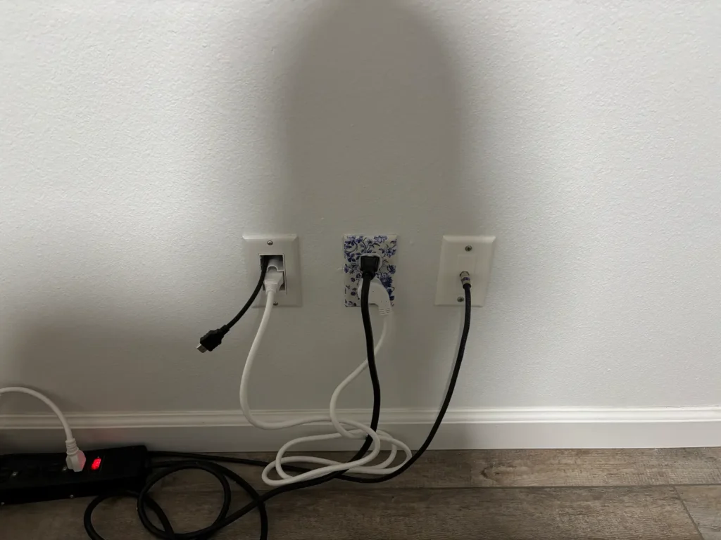Low wall power outlets and cable concealment for TV installation in Ocala Florida
