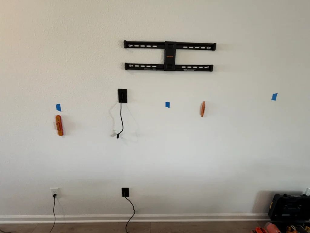 TV wall mount installed with in wall power and cable concealment in Summerfield Florida