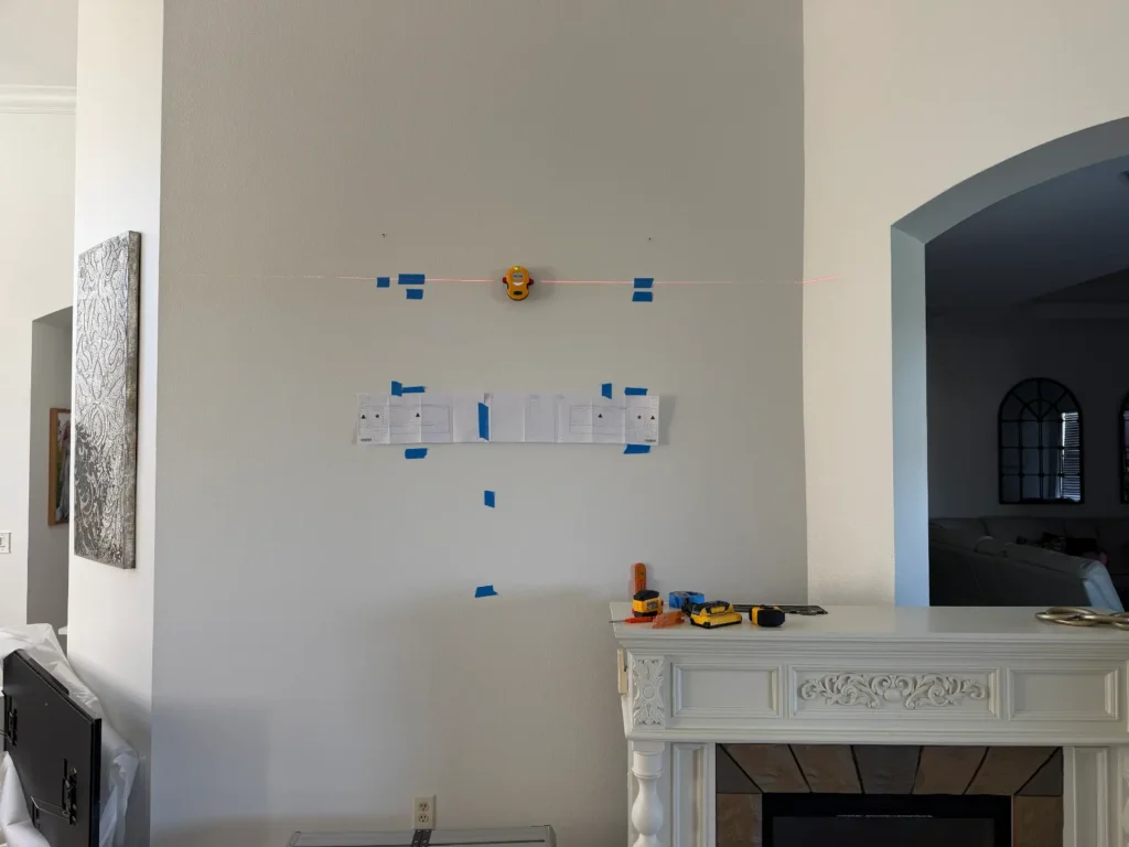 TV wall mount layout marking and measurements before installation in The Villages Florida