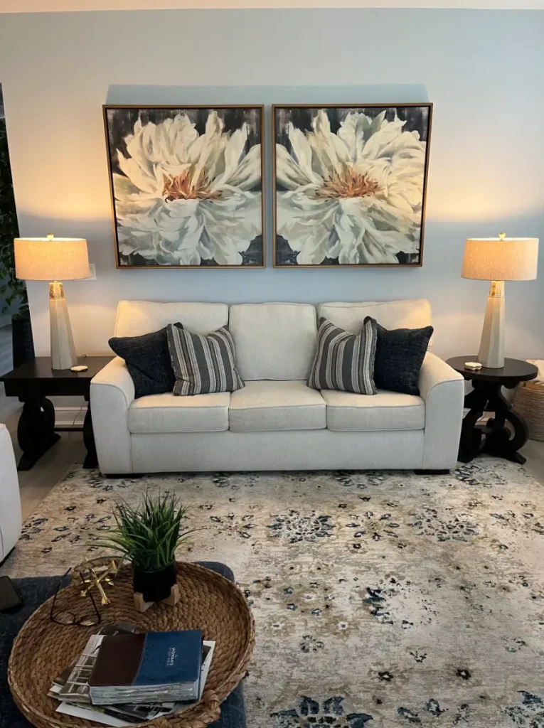 Large matching canvas artwork professionally hung above living room couch in Ocala Florida