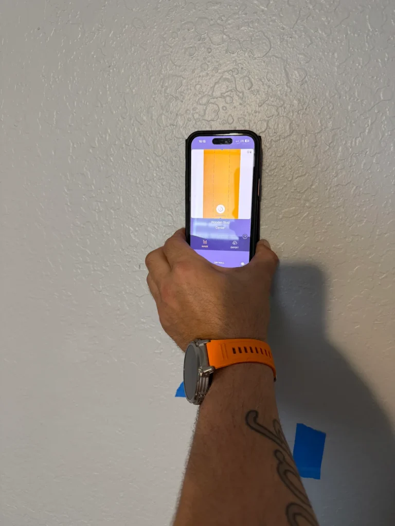 advanced-wall-scanner-detecting-studs-before-tv-installation-ocala-fl.webp