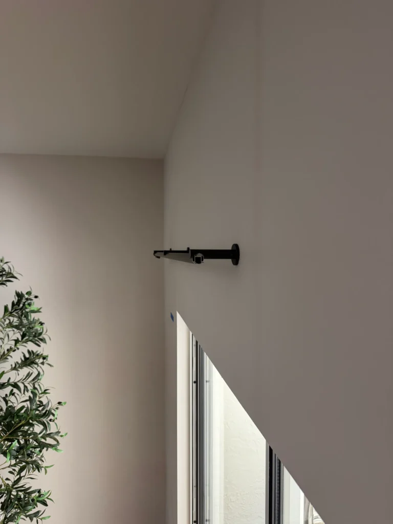 Curtain rod mounting bracket securely installed for curtain rod installation in The Villages Florida